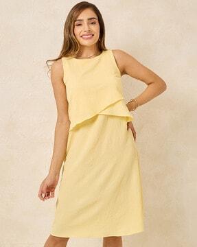 women layered sleeveless midi length dress