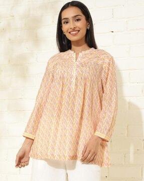 women leaf print fitted tunic with pintucks