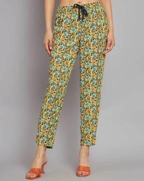 women leaf print relaxed fit flat front trousers with drawstring waist