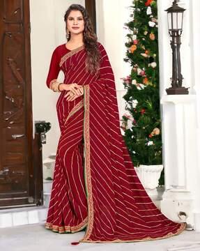 women leheriya print saree with contrast border