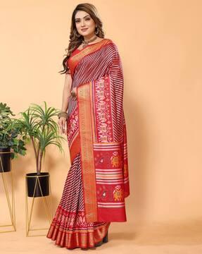 women leheriya print saree with contrast border