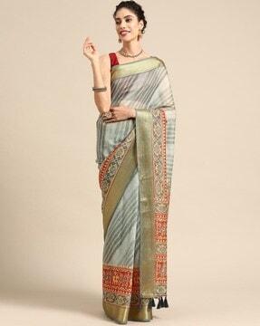 women leheriya print silk cotton saree