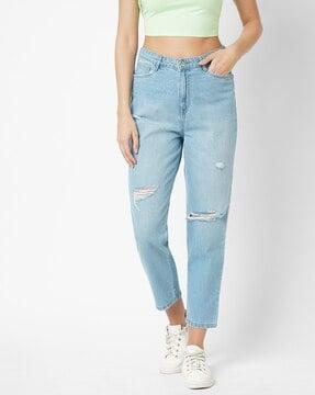 women lightly washed & distressed mom jeans
