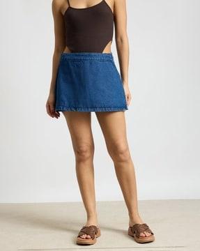 women lightly washed denim straight skorts