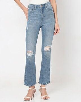 women lightly washed distressed bootcut jeans