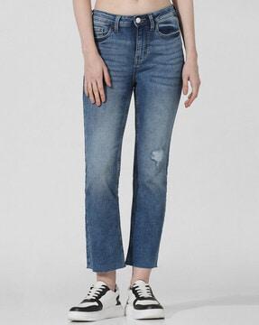 women lightly washed distressed flared jeans