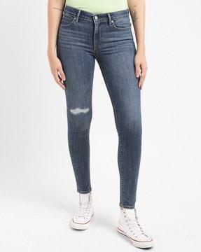 women lightly washed distressed skinny fit jeans