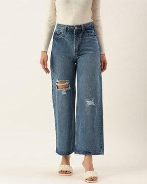 women lightly washed flared jeans