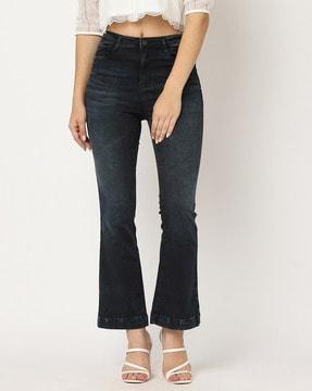 women lightly washed flared jeans