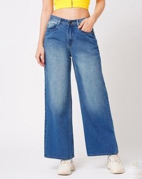 women lightly washed flared jeans