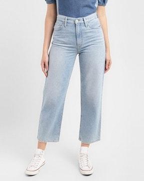 women lightly washed relaxed fit jeans