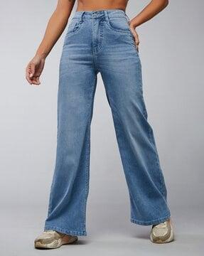 women lightly washed relaxed fit jeans