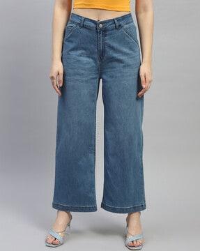 women lightly washed relaxed fit jeans