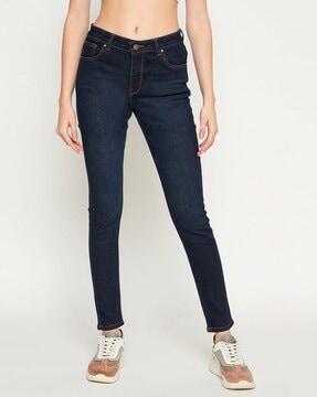 women lightly washed relaxed fit jeans