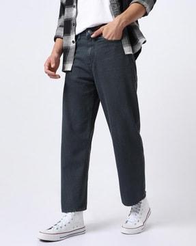 women lightly washed relaxed jeans