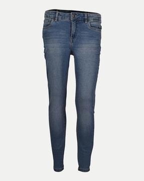 women lightly washed slim jeans