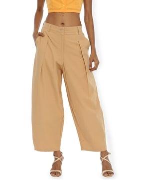 women loose fit pleat-front trousers with insert pockets