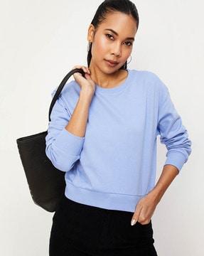 women loose fit sweatshirt with ribbed hem