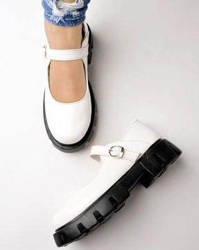 women low-top shoes with buckle closure