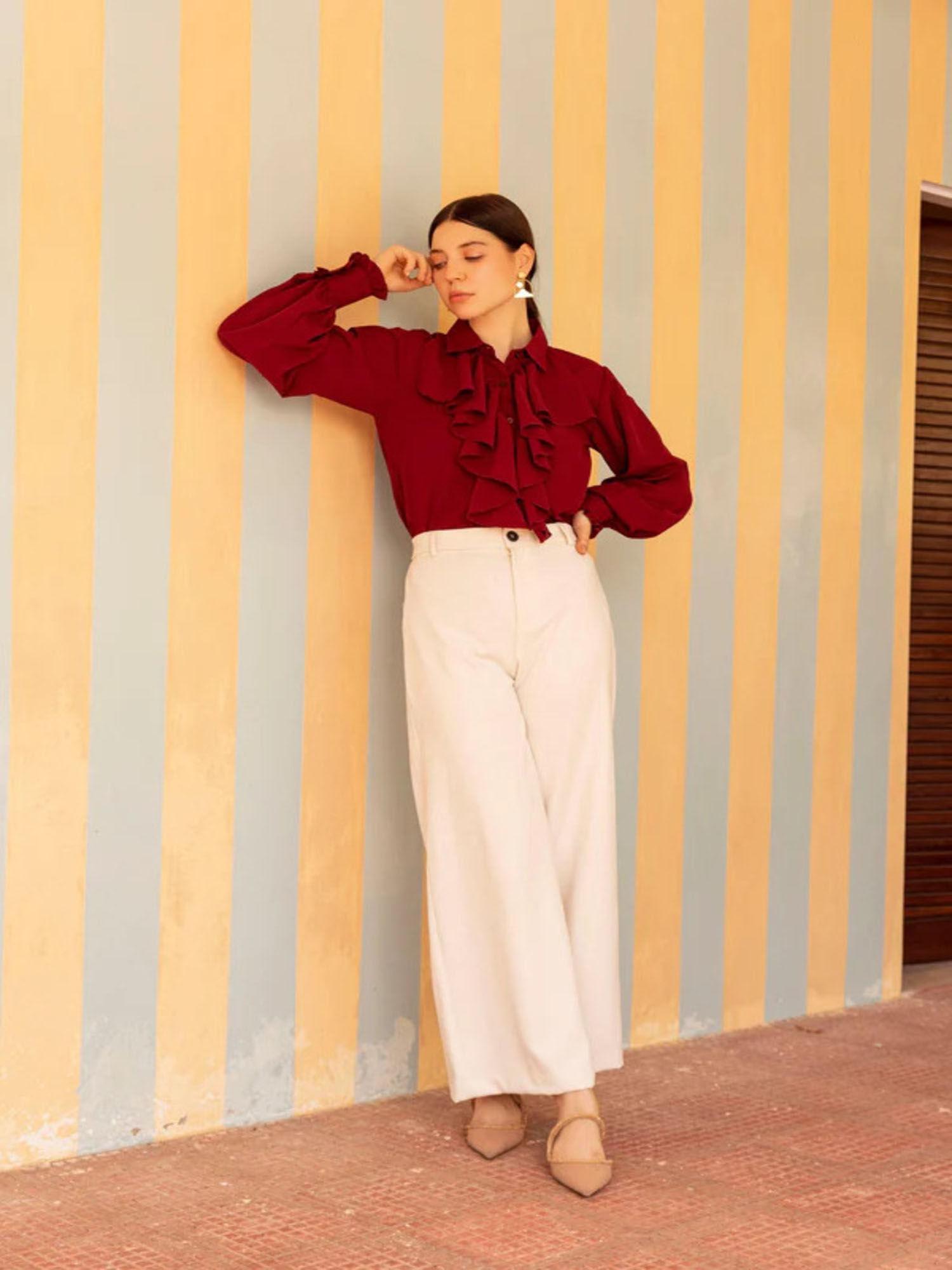 women maroon ruffle shirt