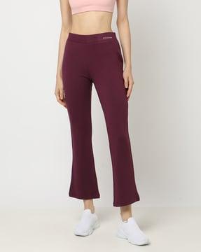women mid-rise flared track pants