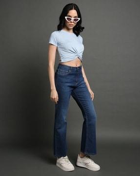 women mid-wash bootcut jeans
