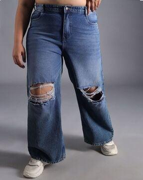 women mid-wash distressed relaxed fit jeans