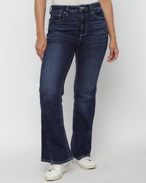 women mid-wash flared jeans