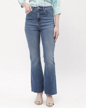 women mid wash flared jeans