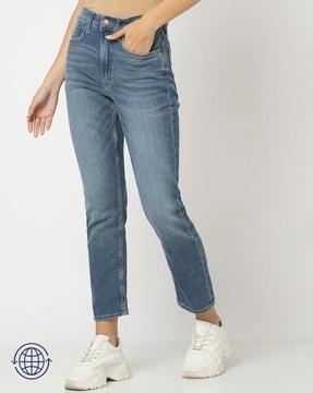 women mid-wash relaxed fit jeans
