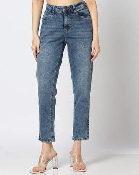 women mid-wash slim fit jeans