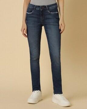 women mid-wash slim fit jeans