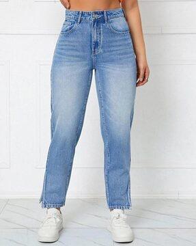 women mid-washed tapered jeans