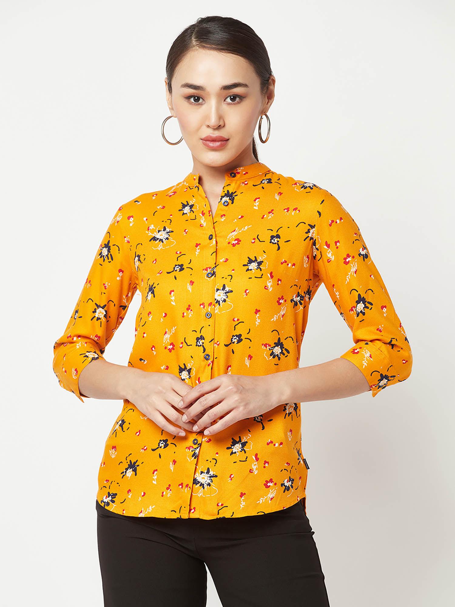 women mustard floral shirt