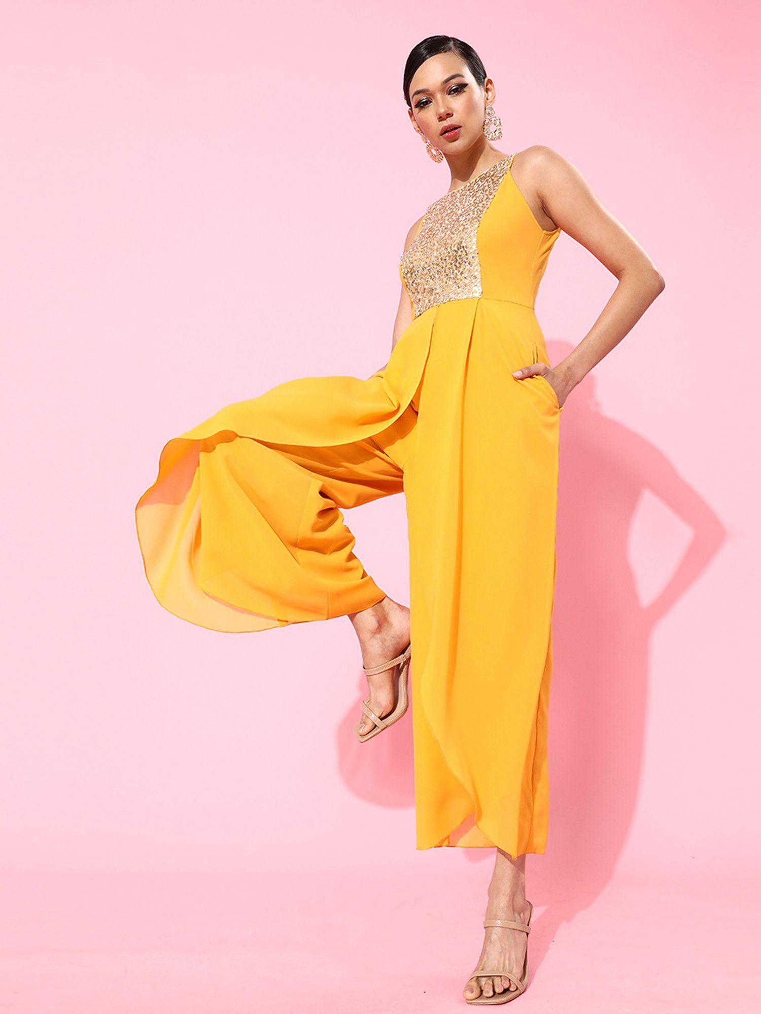 women mustard halter neck sleeveless solid embellished regular jumpsuit