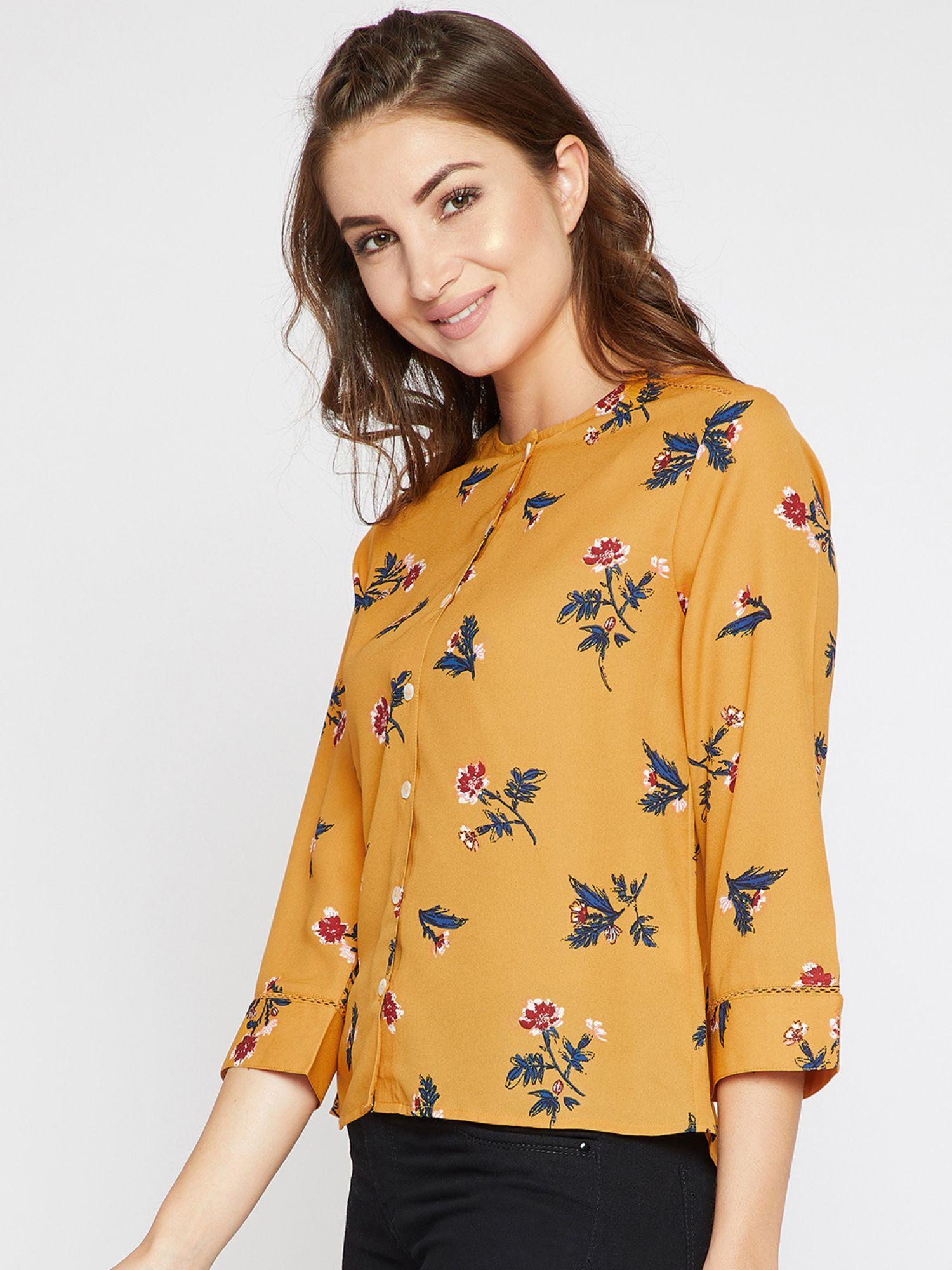 women mustard round neck floral printed top