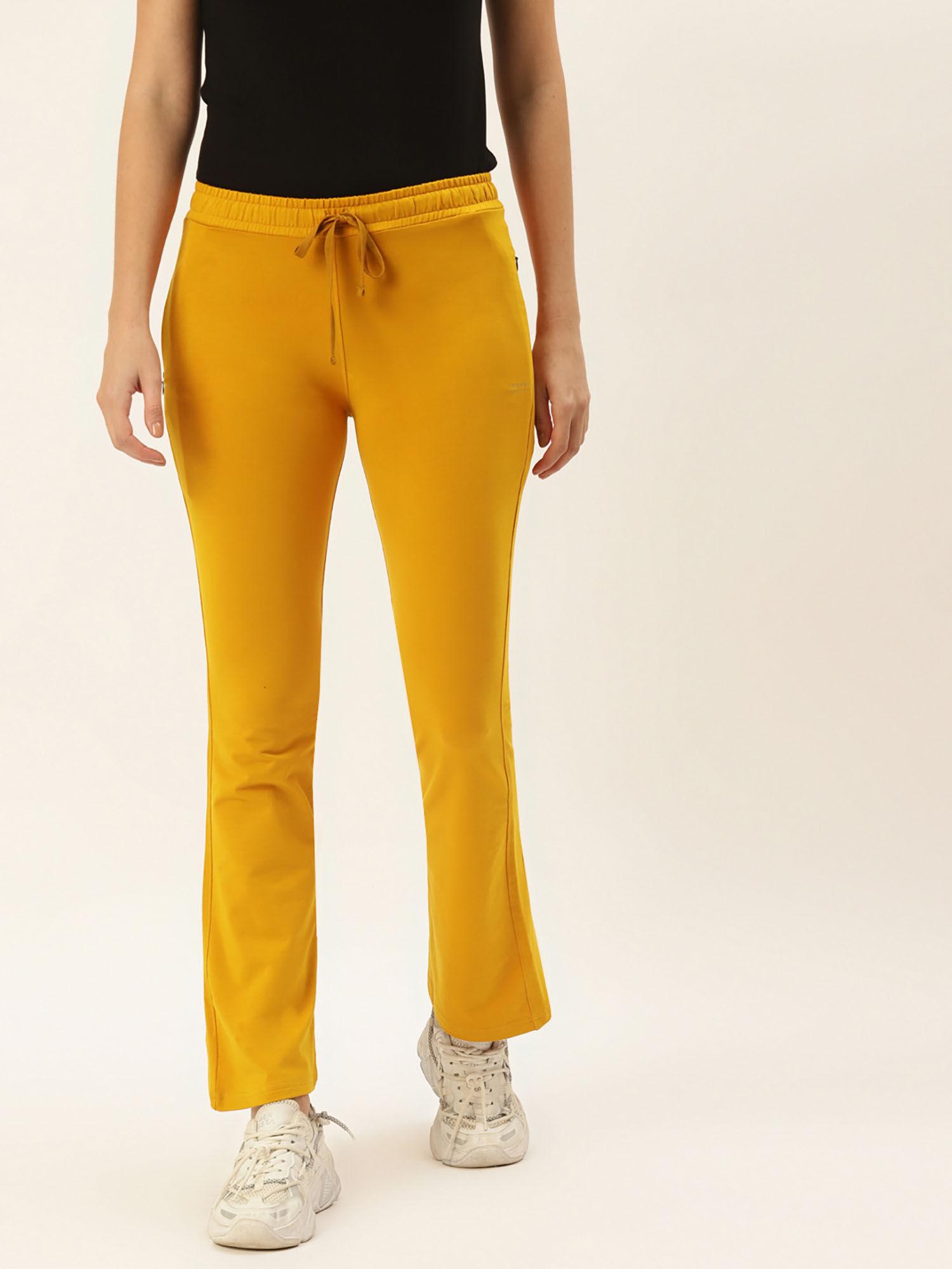 women mustard solid bootcut fit track pants