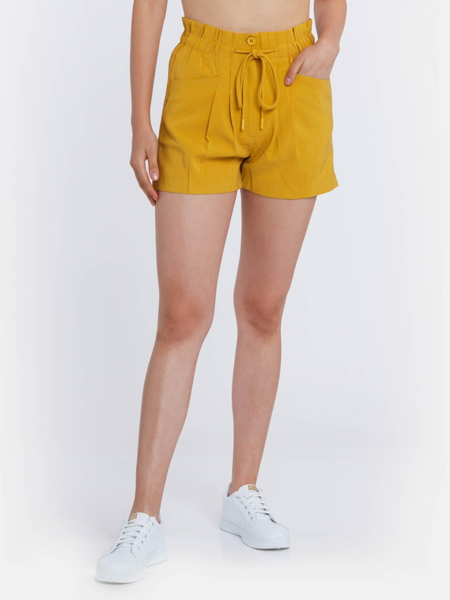 women mustard solid shorts