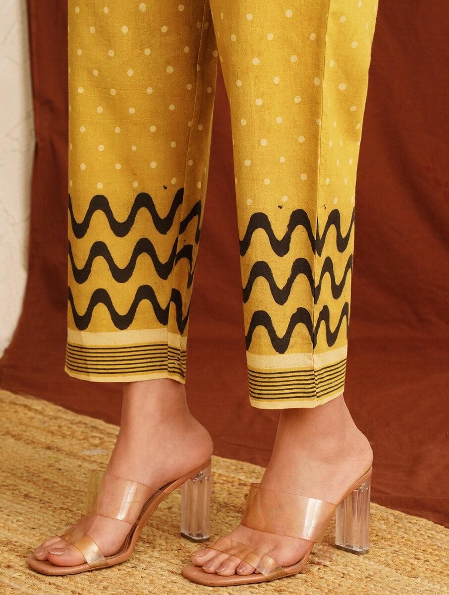 women mustard yellow cotton printed ankle length straight fit pants