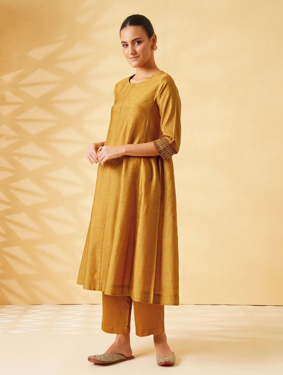 women mustard yellow kurta and slip