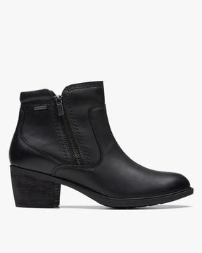 women neva zip wp ankle-length boots