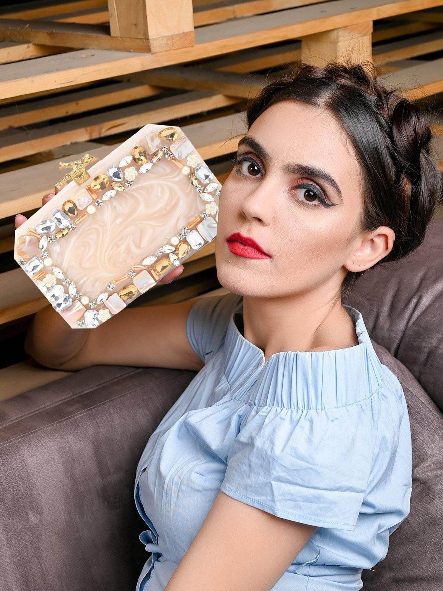 women off white resin embellished clutch