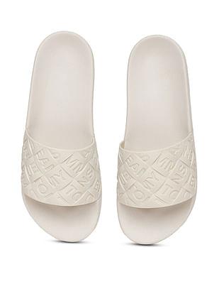 women open toe embossed slides