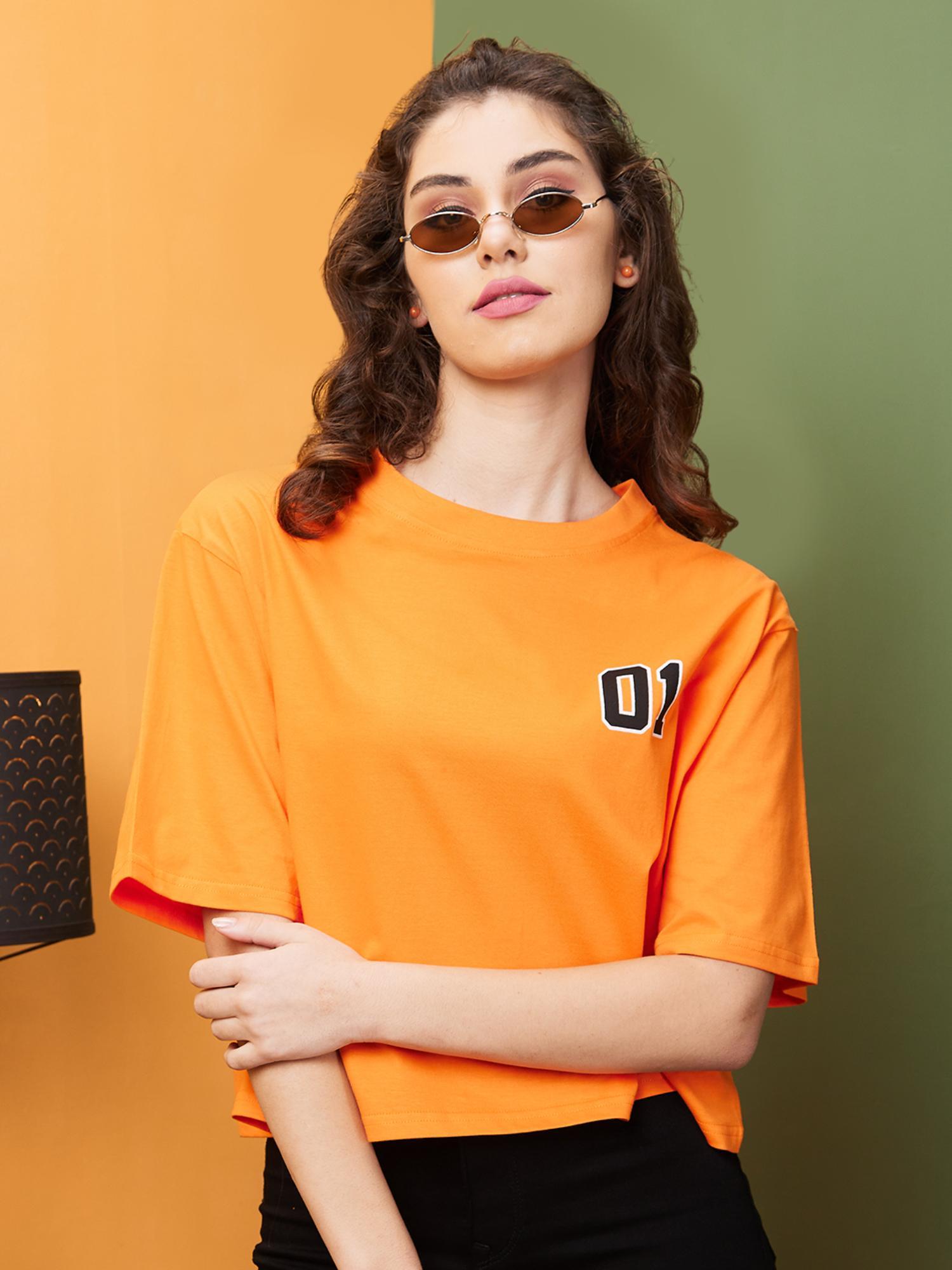 women orange boxy fit typography round neck t-shirt