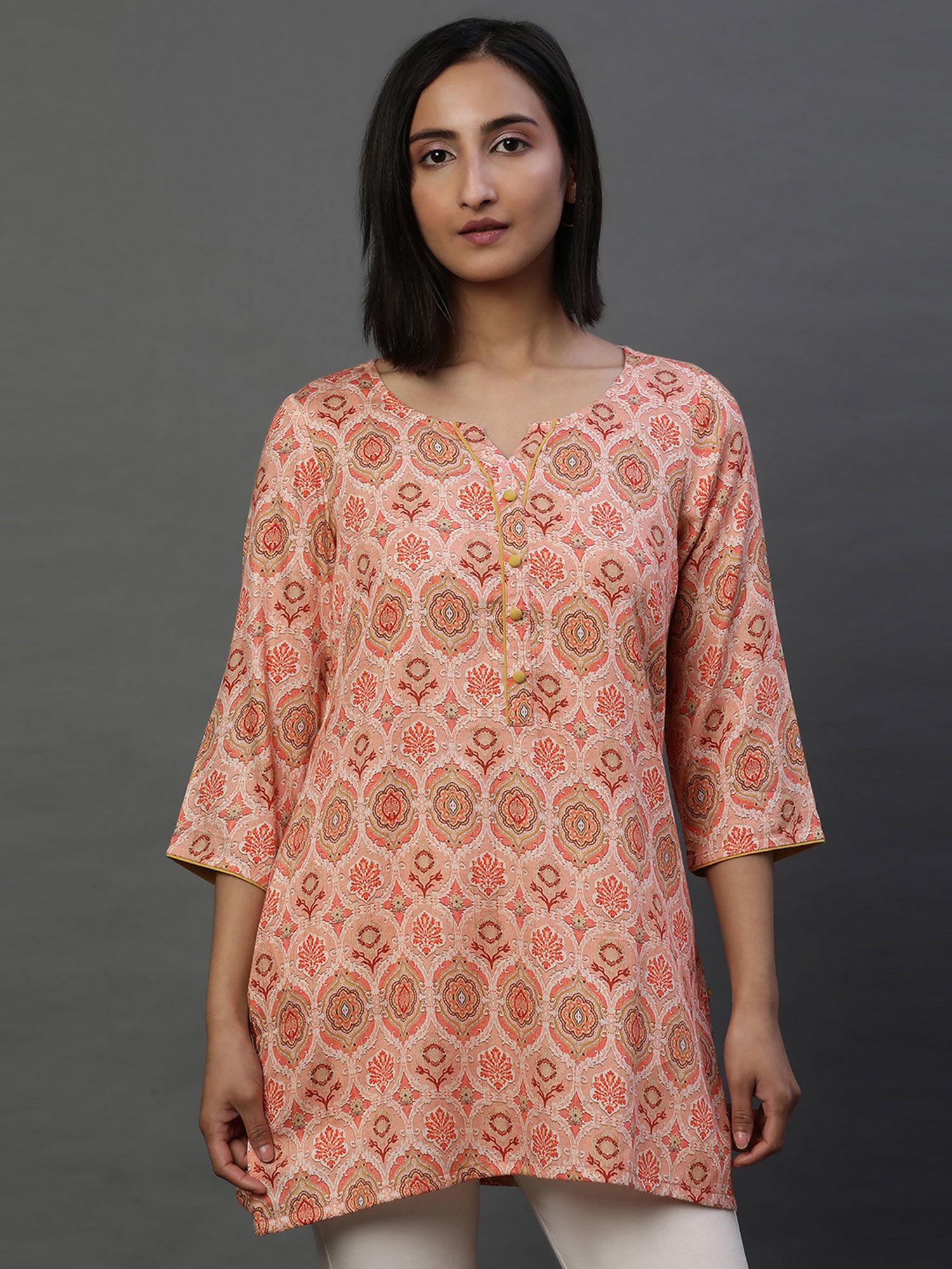 women orange floral cotton kurti