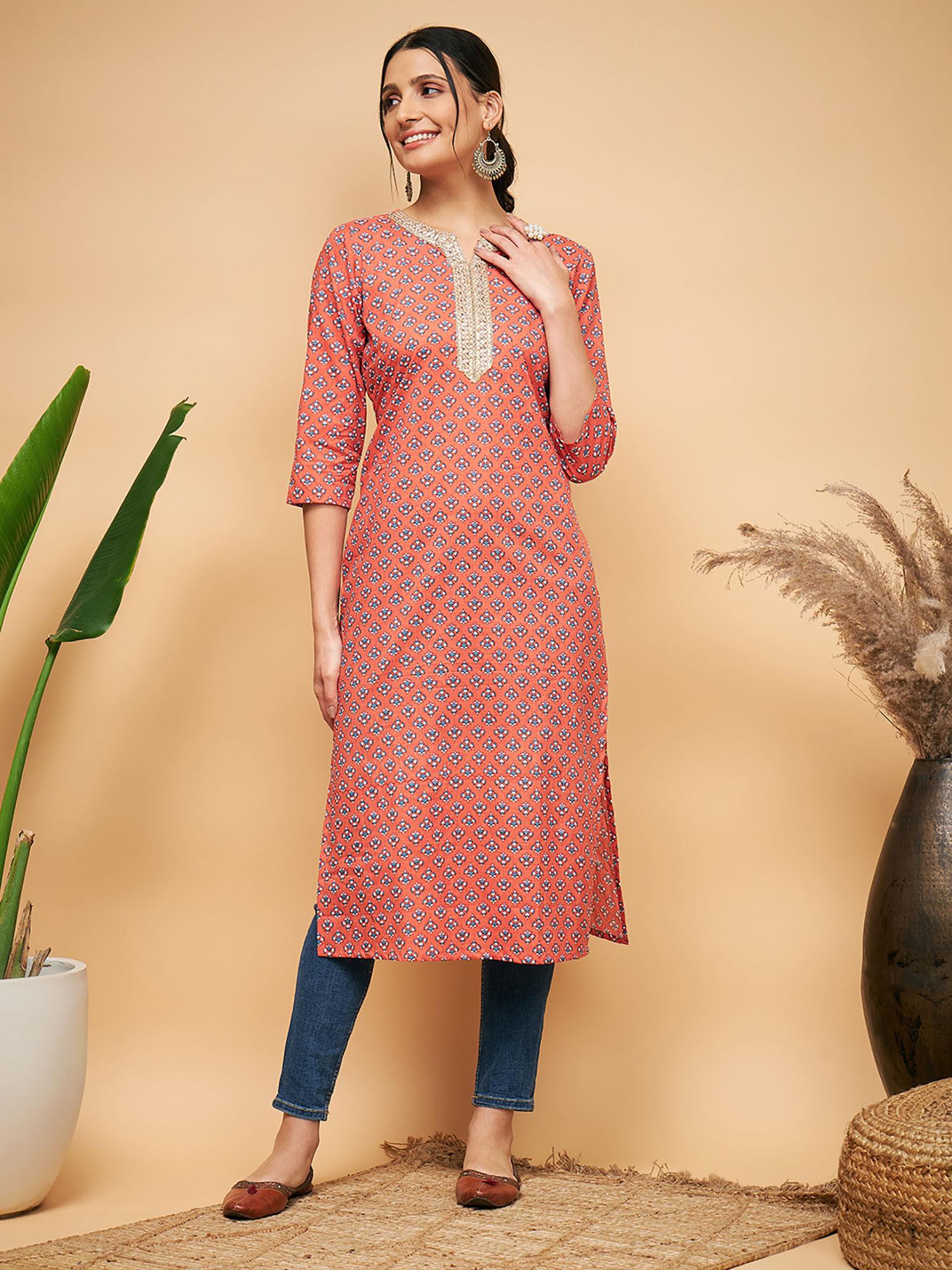 women orange floral kurta