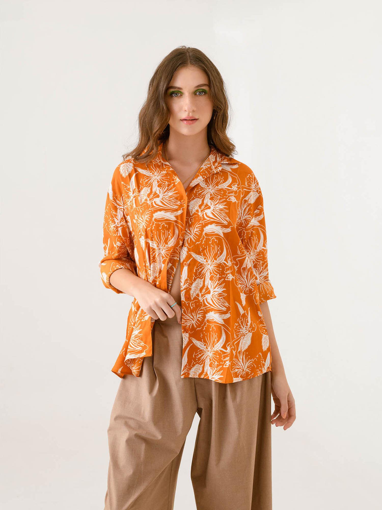 women orange floral shirt