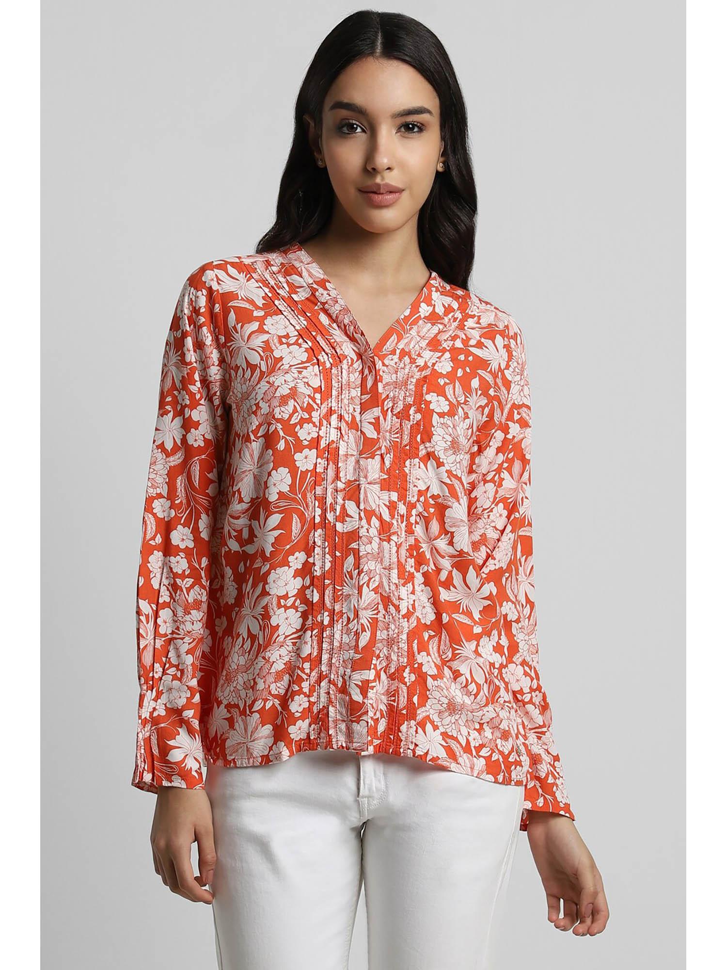 women orange print long sleeves shirt