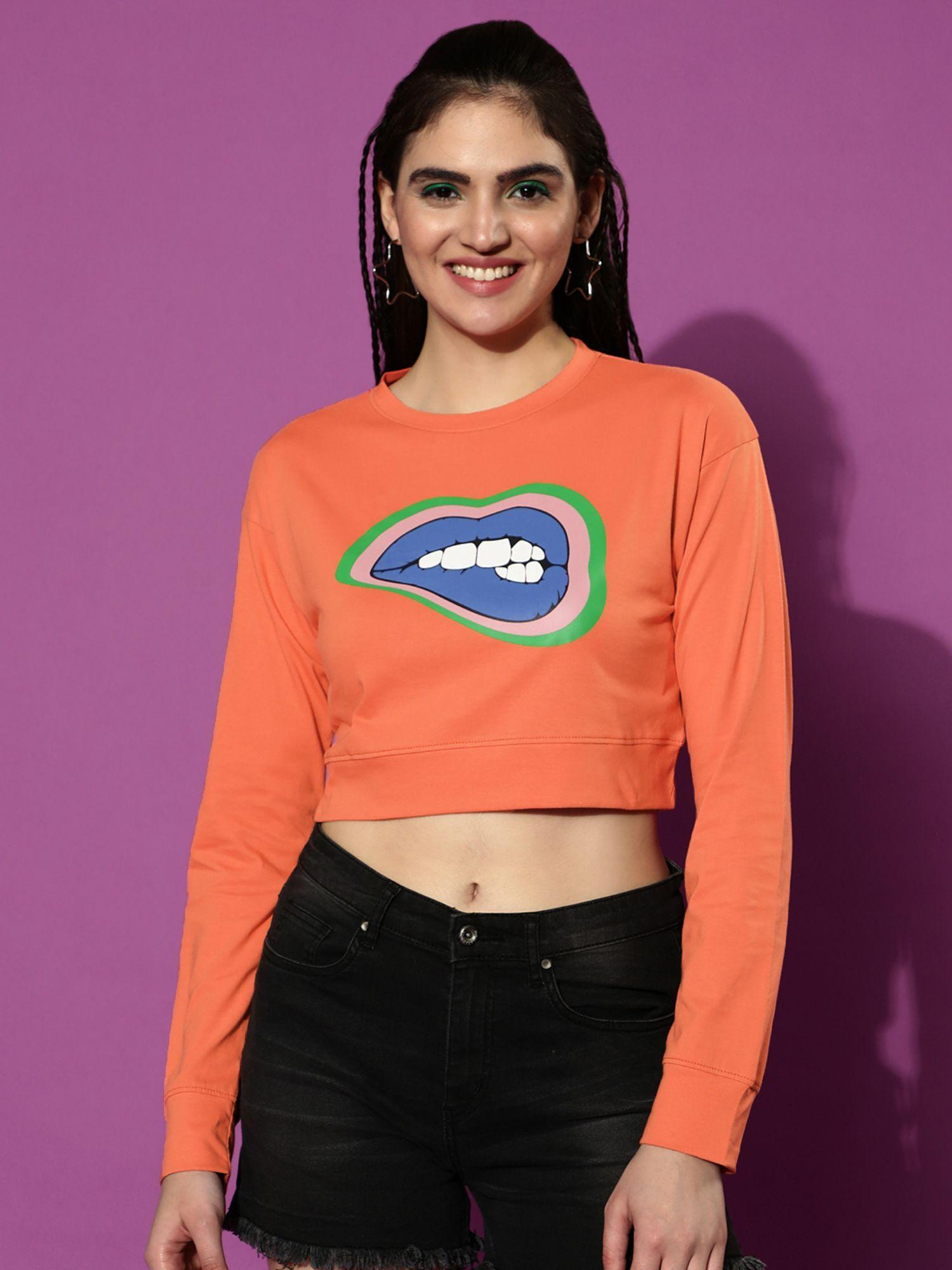 women orange round neck full sleeves regular fit graphic crop top