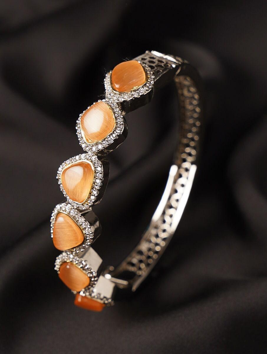 women orange silver tone alloy cuffs &amp; bracelet